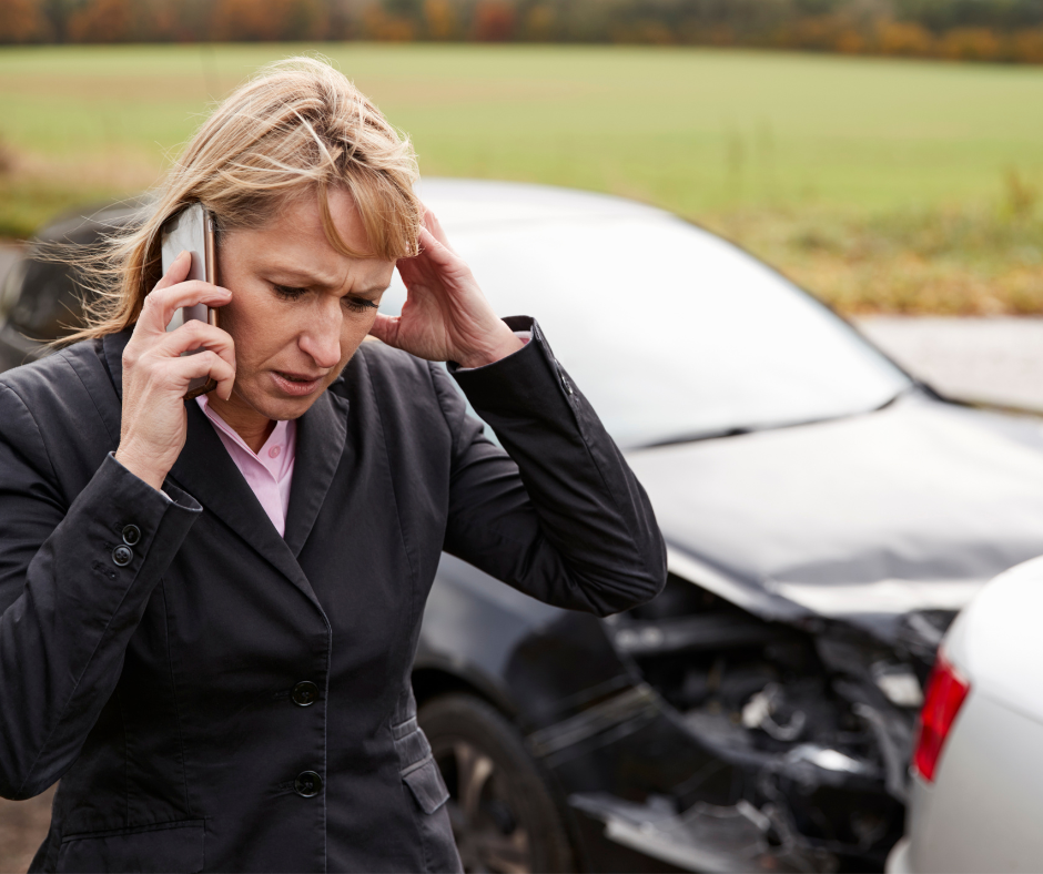 woman calling insurance company after car wreck