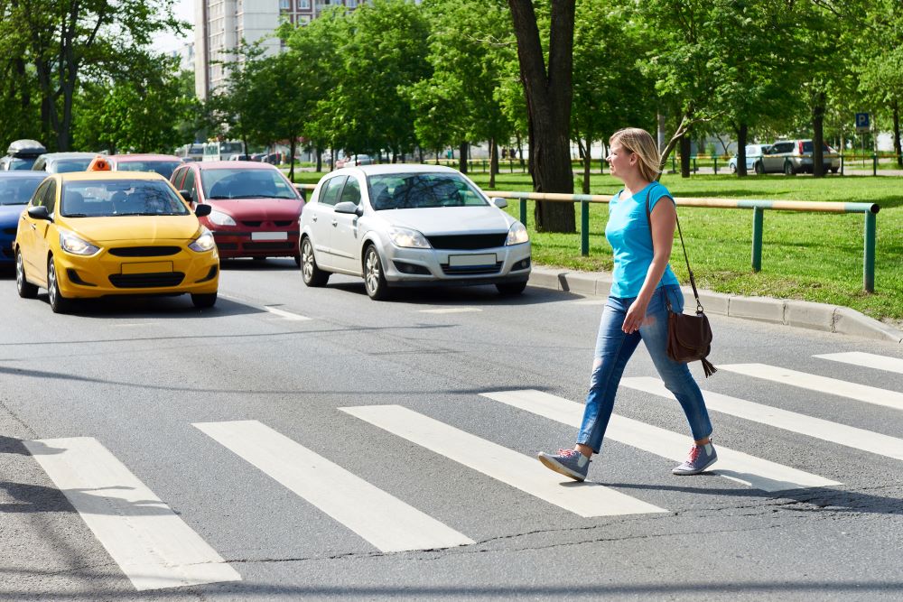 woman crossing road